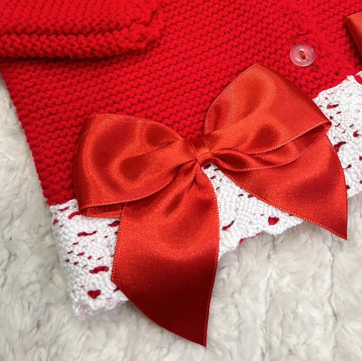 Red knitted bow cardigan